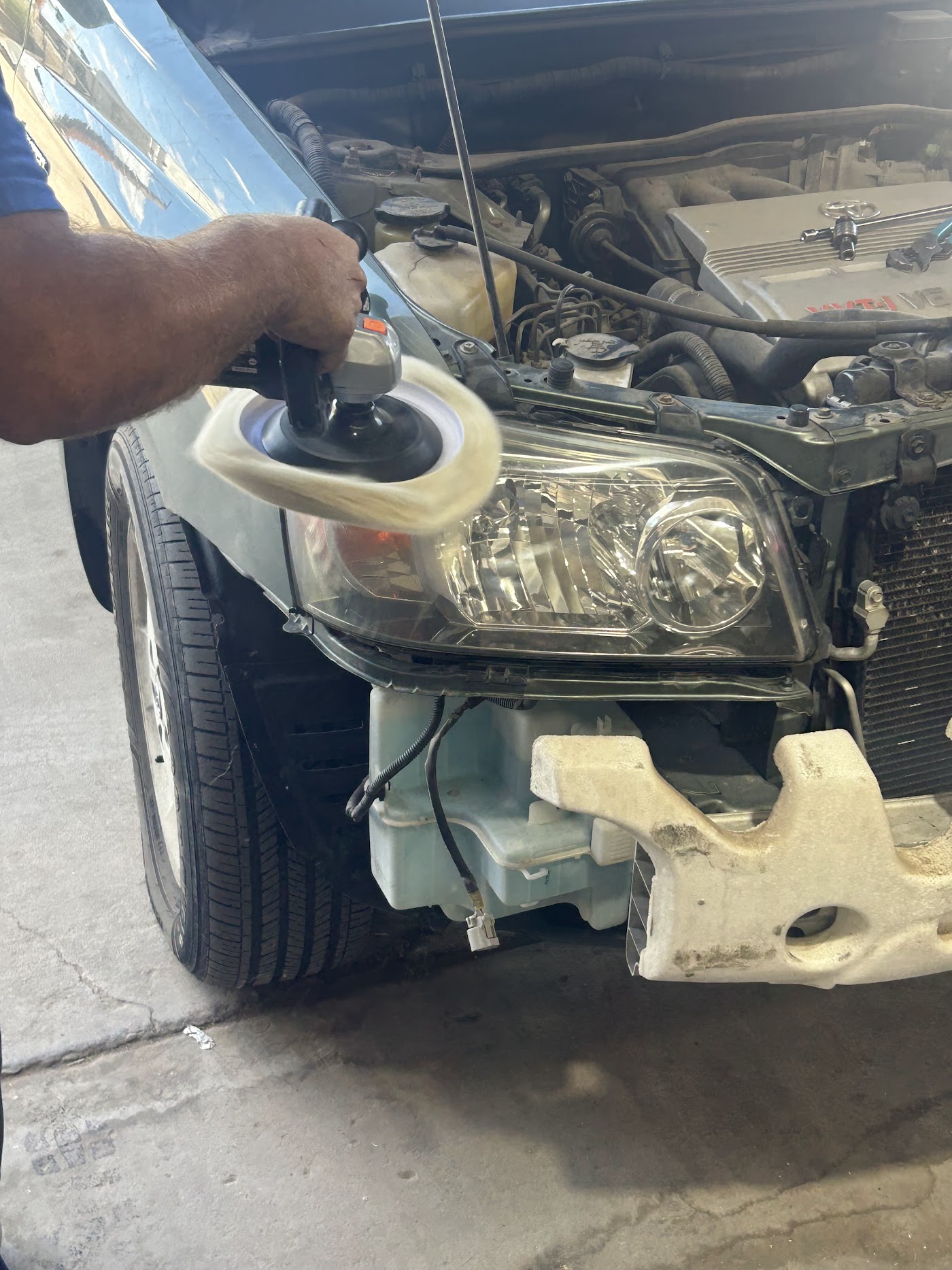 Headlight restoration at Phoenix Auto Repair & Body Shop, 24th St & Thomas